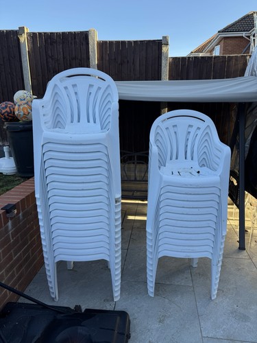 White plastic chairs - white,